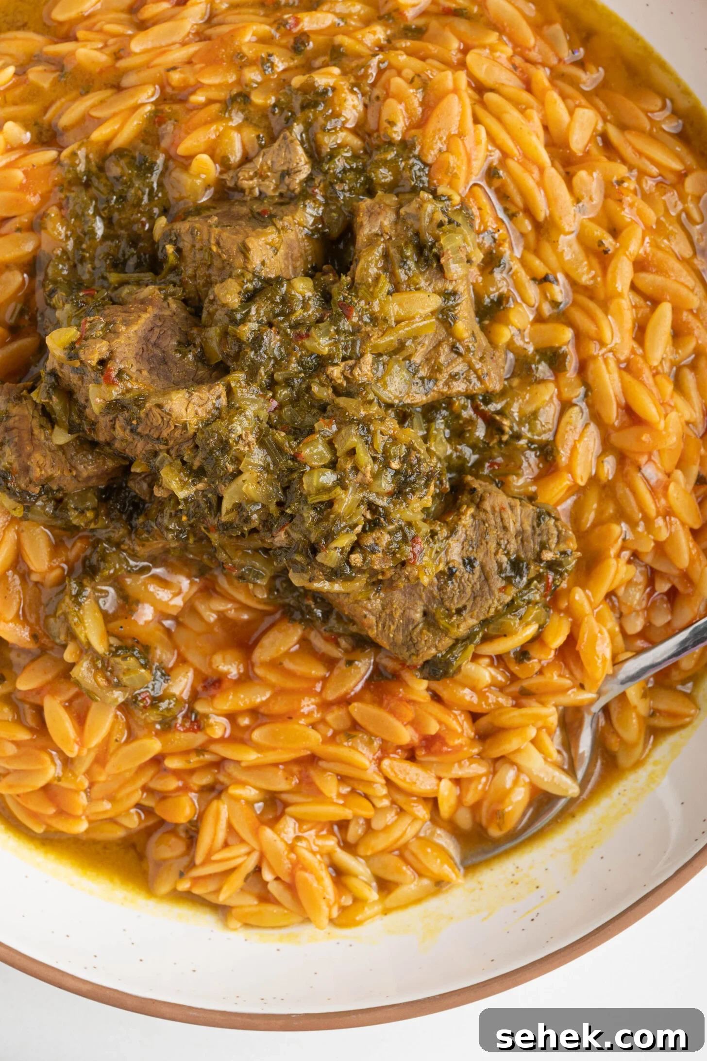 Moroccan Lamb and Orzo Recipe with Warm Spices 11 a bowl of orzo with lamb