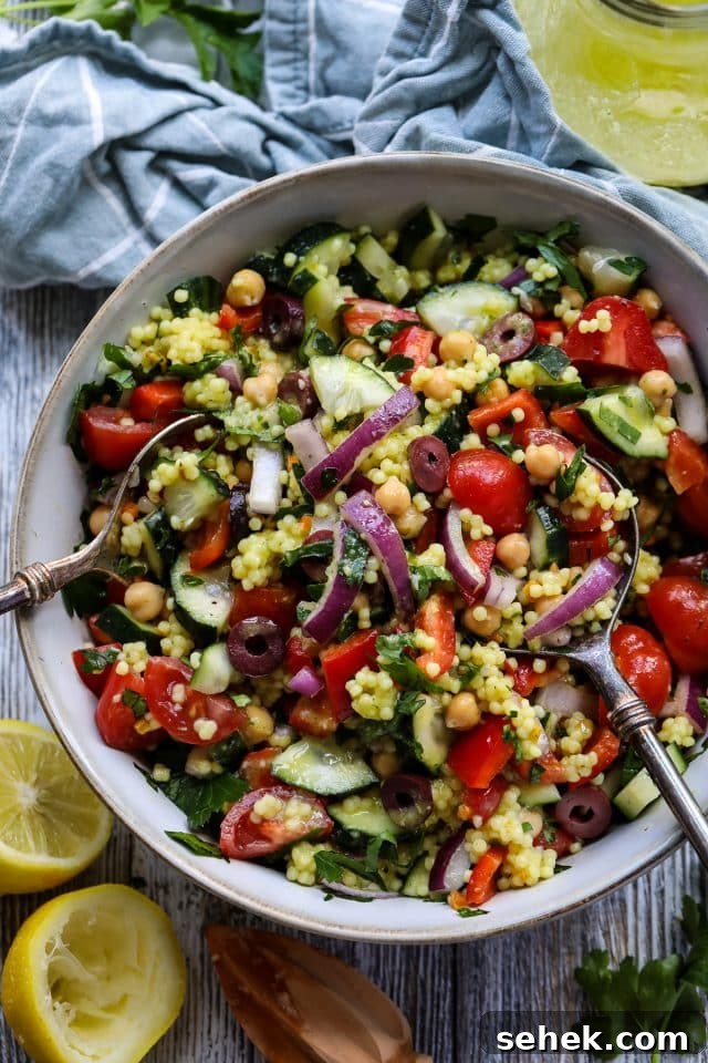 Vibrant Vegan Couscous Salad with Roasted Veggies and Herbs 2 Mediterranean couscous salad in a bowl.