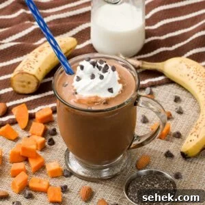 High-Protein Chocolate Sweet Potato Smoothie Recipe 9 Chocolate sweet potato smoothie with whipped cream on top.