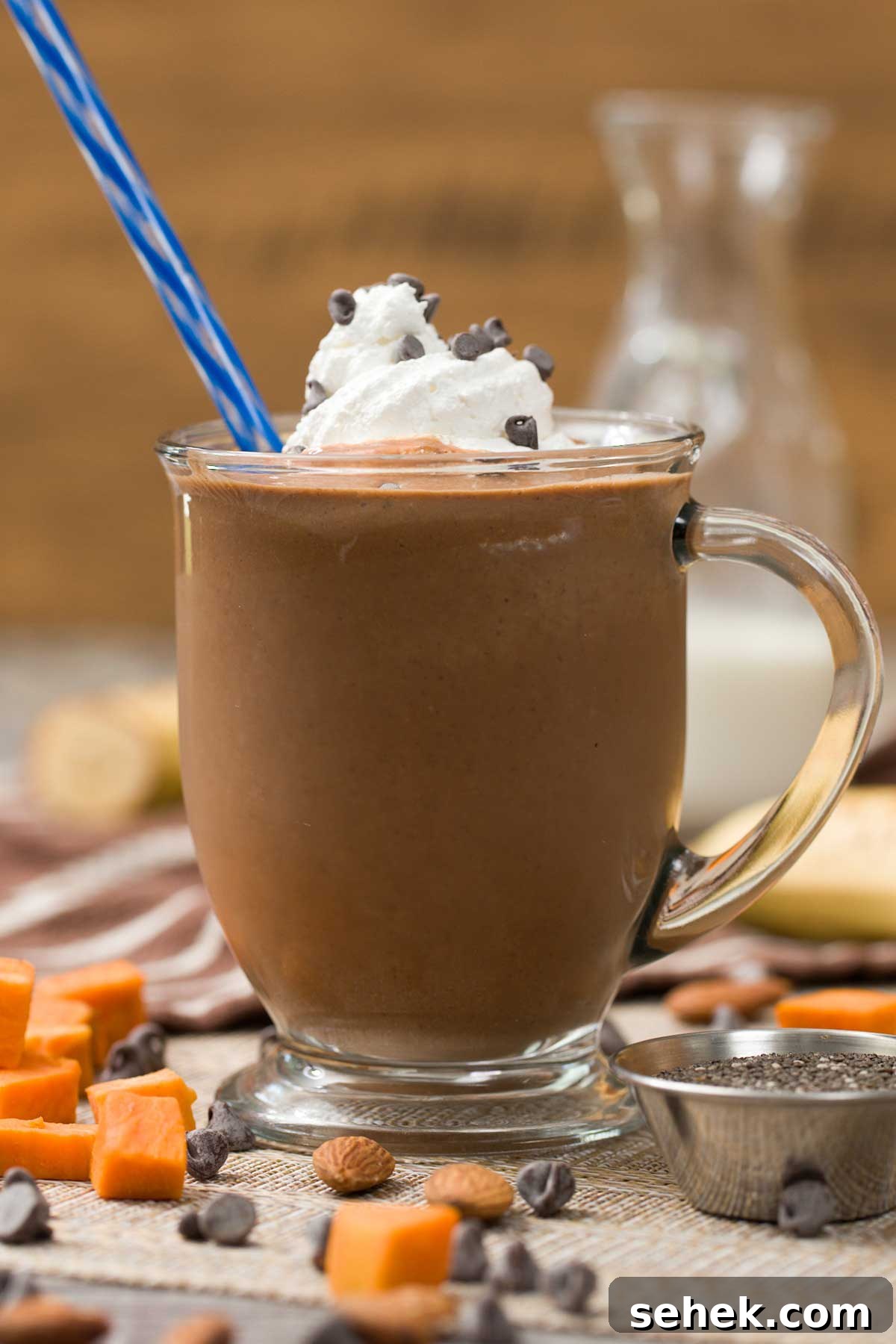 High-Protein Chocolate Sweet Potato Smoothie Recipe 4 Chocolate sweet potato smoothie with whipped cream on top.