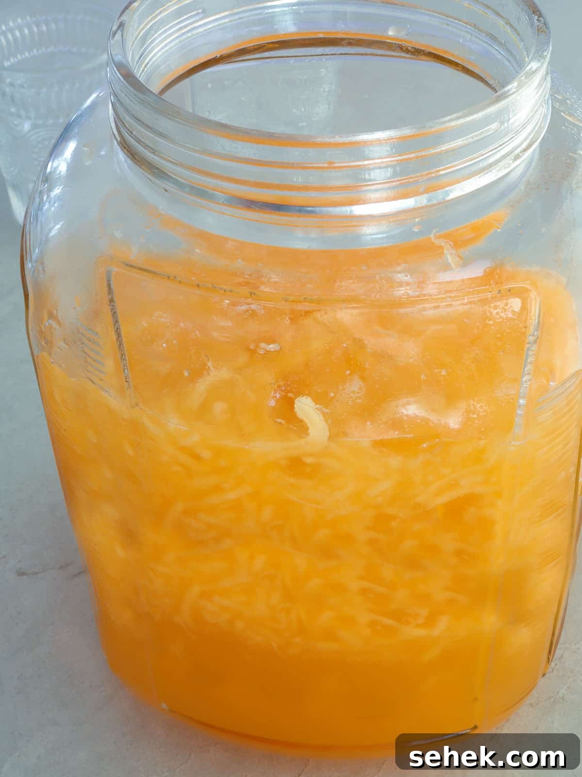 Refreshing Melon Juice Recipe: Fresh Melon Drink for Summer 2 Melon Juice in a glass jar with ice