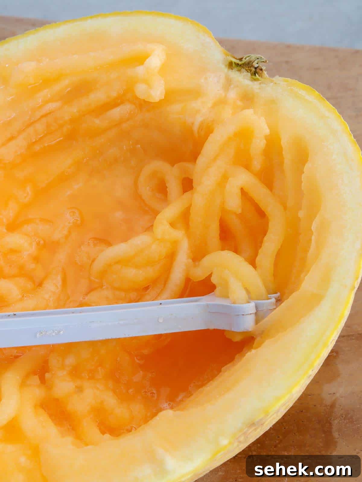 Refreshing Melon Juice Recipe: Fresh Melon Drink for Summer 5 shredding cantaloupe flesh with shredder