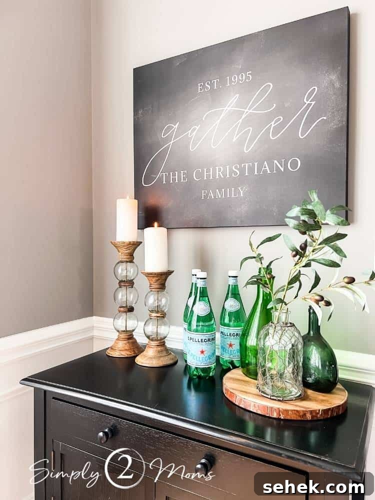 Italian-Inspired Tablescape Ideas for Elegant Dinner Parties 8 side board with word art above on wall