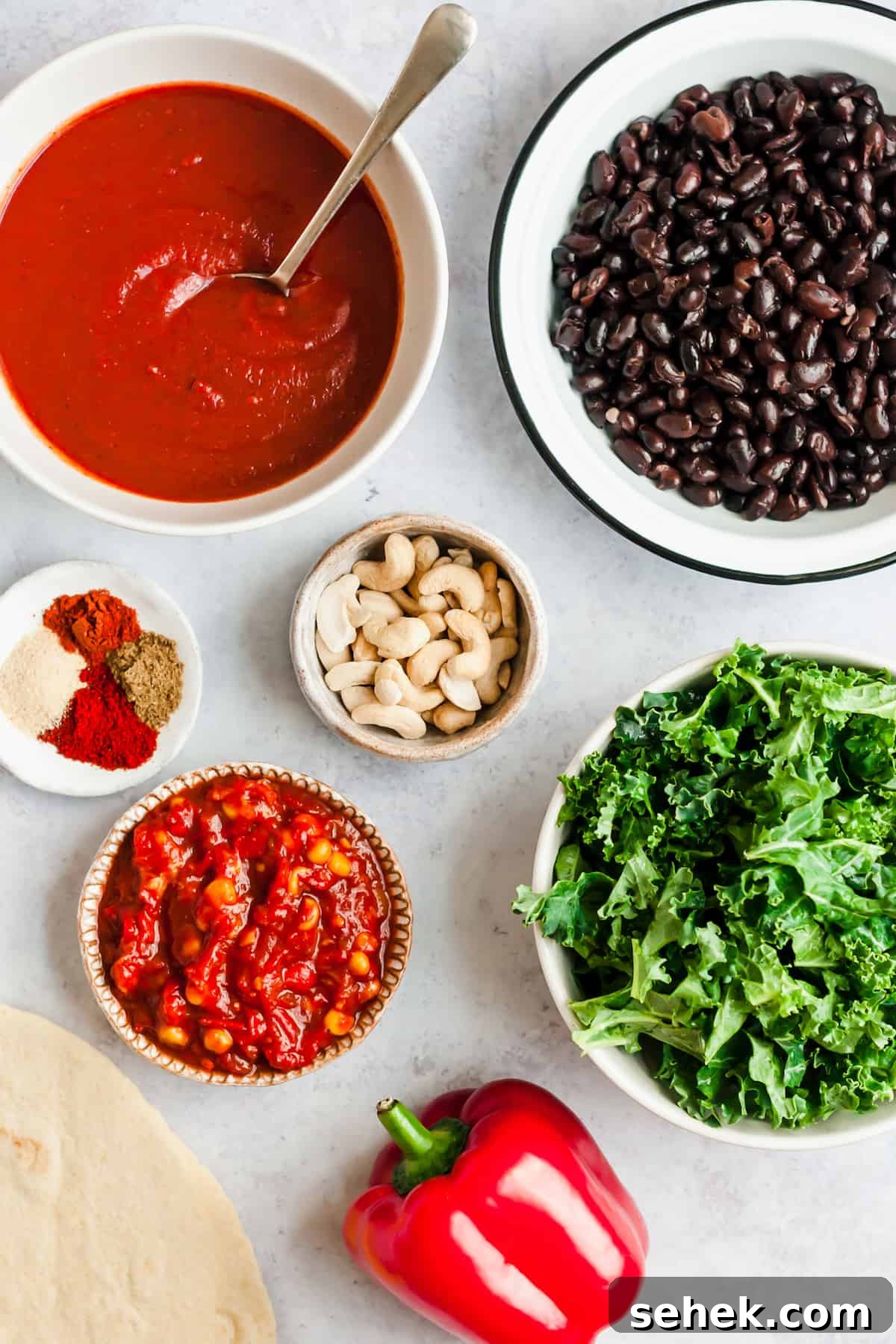 Vegan Black Bean and Kale Enchiladas Recipe for Flavorful Dinner 4 bowl of black beans, enchiladas, and ingredients for enchiladas