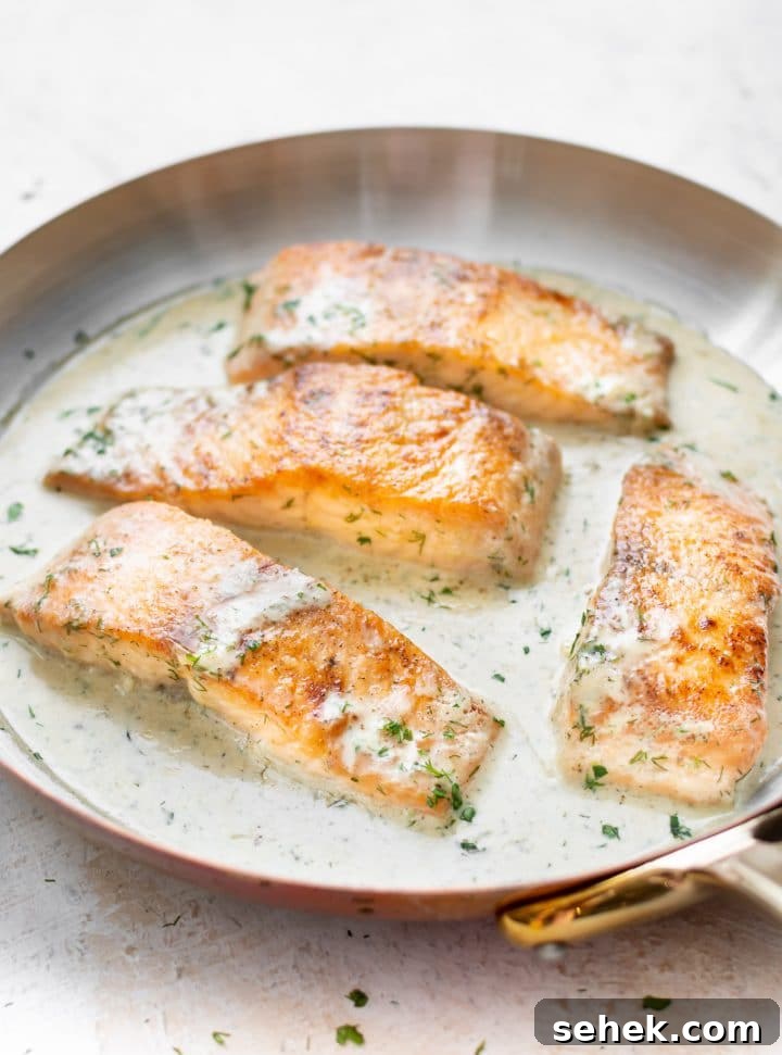 Creamy Dill Salmon Recipe with Lemon and Garlic 6 lemon dill salmon in a copper skillet