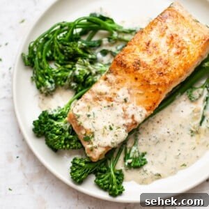 Creamy Dill Salmon Recipe with Lemon and Garlic 7 creamy dill salmon plated with broccolini and lots of sauce