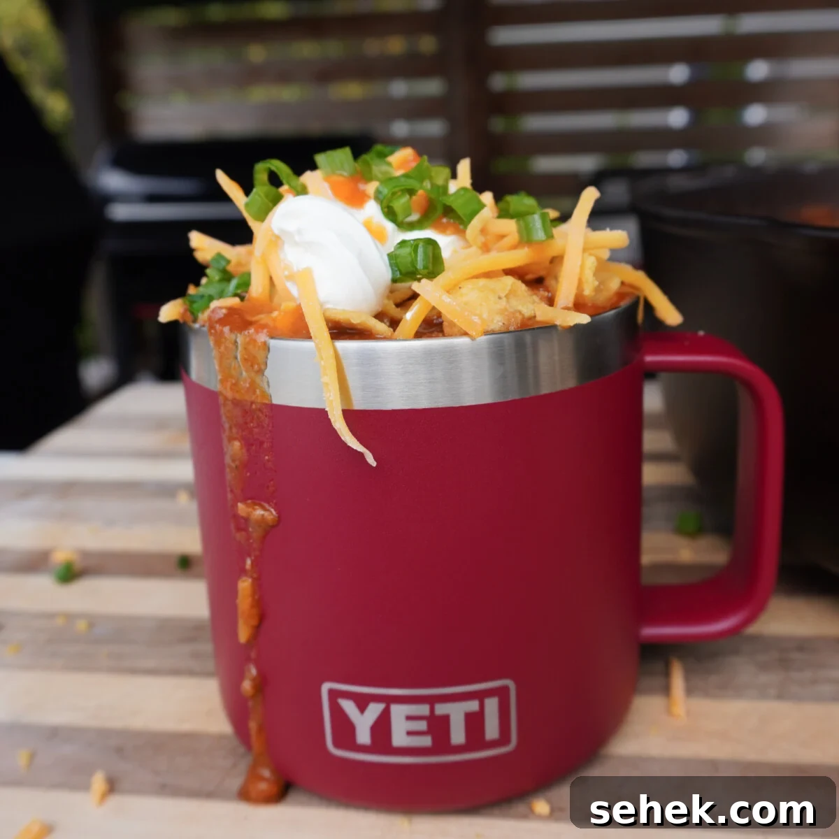 Loaded Beef Chili Recipe: Over-the-Top Comfort Chili 10 Over the top chili in a red up loaded with toppings.