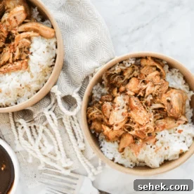 Instant Pot Honey Mustard Chicken with Roasted Potatoes 11 a beige bowl filled with white rice and shredded bourbon chicken