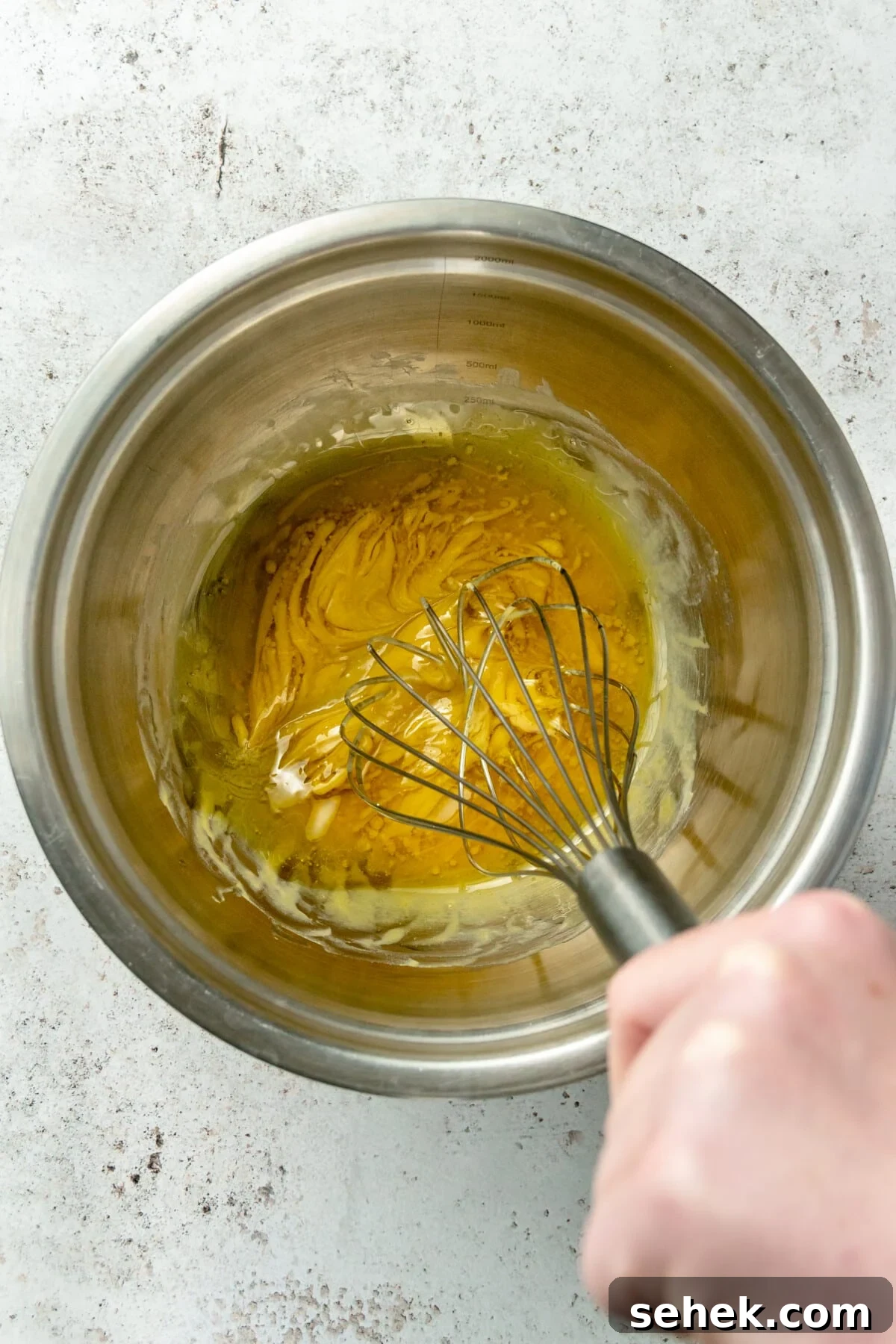 Instant Pot Honey Mustard Chicken with Roasted Potatoes 4 Honey mustard sauce whisked in a stainless steel bowl