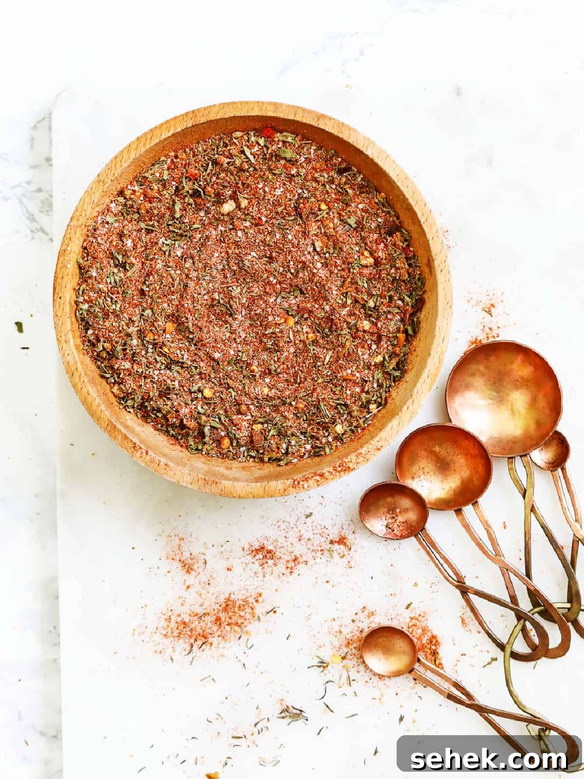 Authentic Cajun Seasoning Mix Recipe for Bold Flavor 2 Wood bowl with Cajun seasoning
