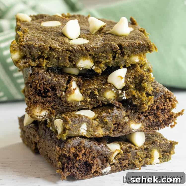 Chewy Matcha Blondies with White Chocolate Swirls 2 close up of matcha blondies in a stack