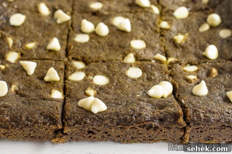 Chewy Matcha Blondies with White Chocolate Swirls 11 side view of the cookie bars