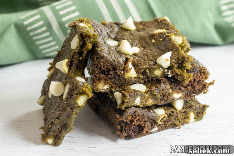 Chewy Matcha Blondies with White Chocolate Swirls 3 stack of blondies with matcha