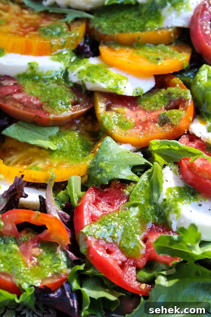 Caprese Salad with Fresh Basil Vinaigrette 5 Caprese salad on platter.