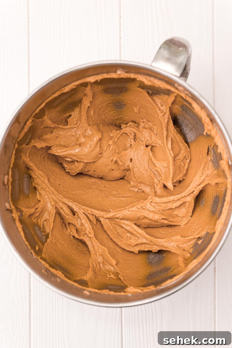Chewy Peanut Butter Cookies with Crispy Edges: Simple Recipe 5 shortening, peanut butter, brown sugar, eggs, and vanilla mixed together in a bowl