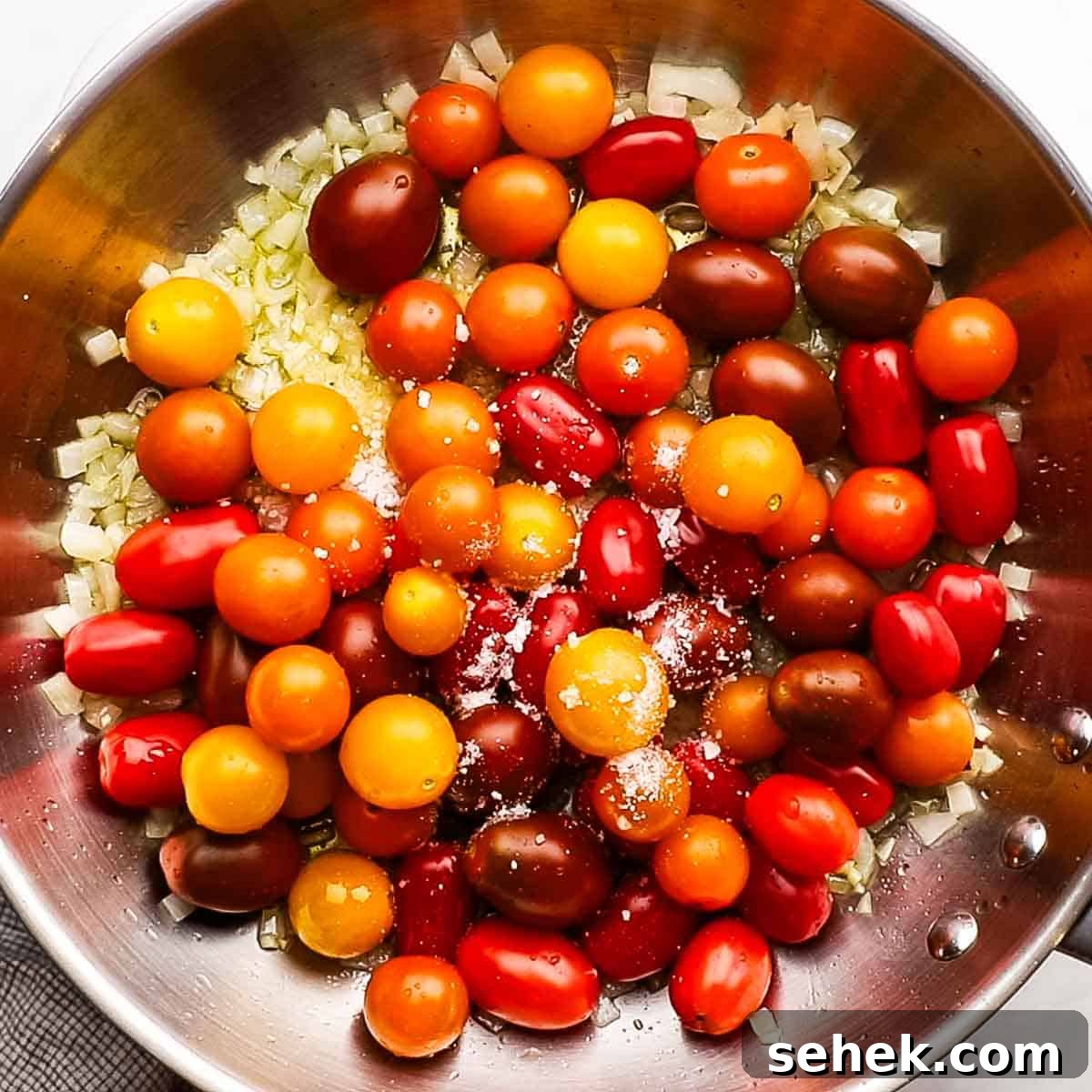Quick Cherry Tomato Pasta with Garlic and Basil 7 cherry tomatoes added to the skillet
