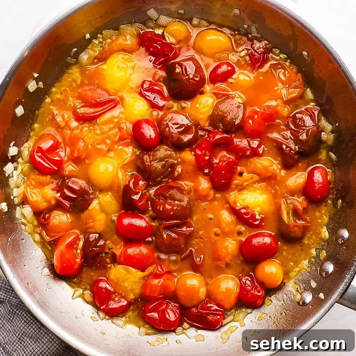 Quick Cherry Tomato Pasta with Garlic and Basil 9 cherry tomato pasta sauce in a skillet