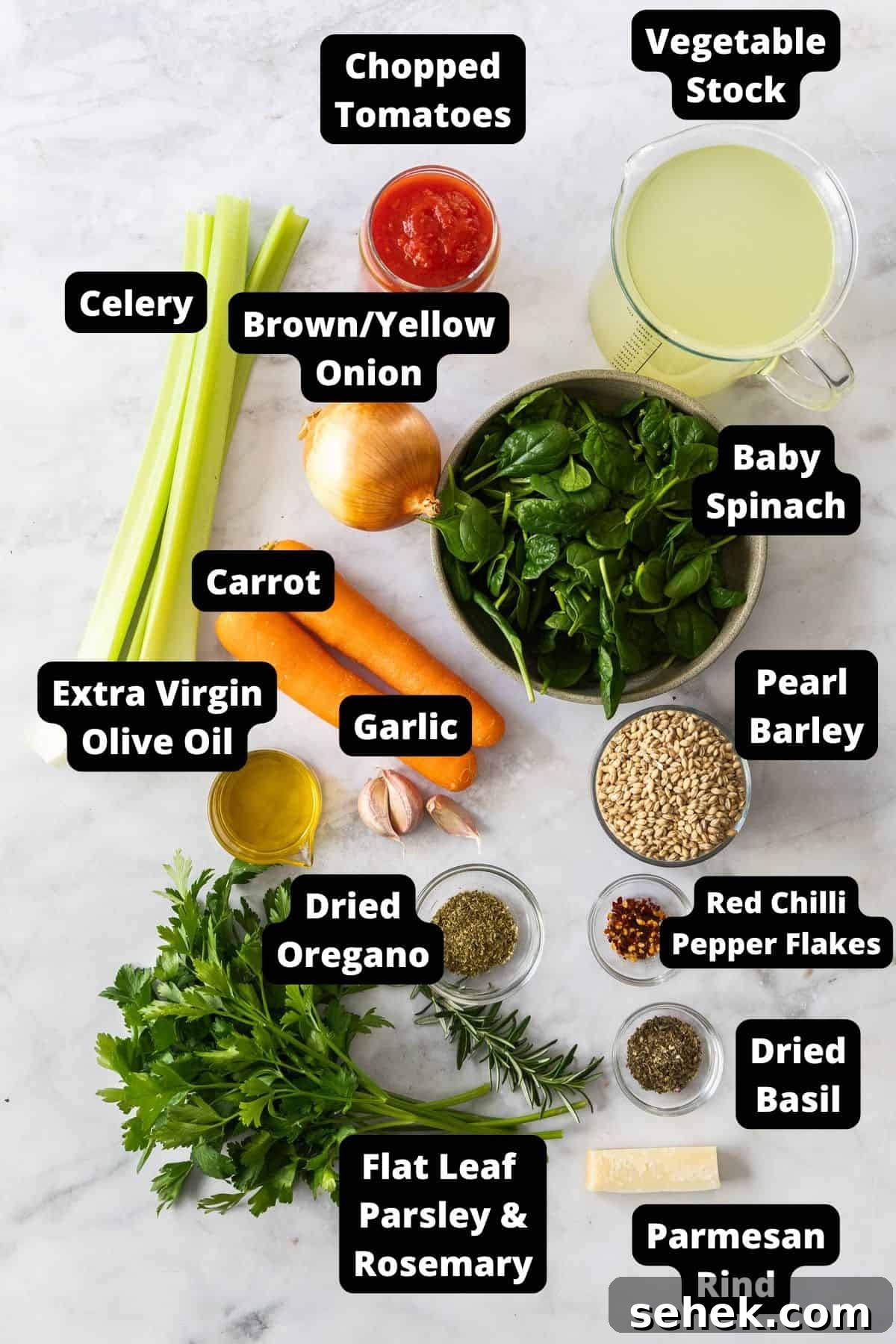 Mediterranean Barley Vegetable Soup Recipe for Flavorful Comfort 3 Ingredients in this recipe on a white marble background.
