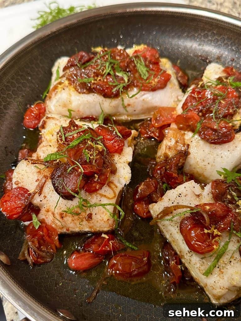 Roasted Tomato, Shallot & Fish One-Pan Dinner Recipe 2 Roasted cherry tomatoes and fish in a skillet
