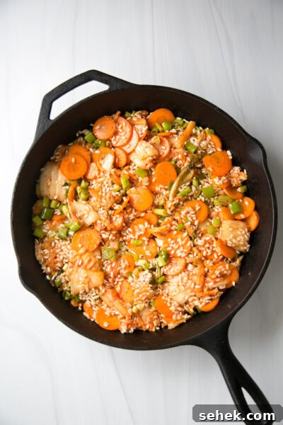 5-Ingredient Gluten-Free Kimchi Chicken Casserole 11 gluten-free chicken casserole rice in a skillet