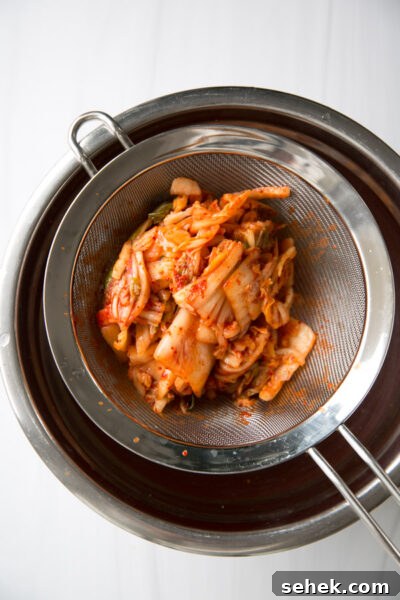 5-Ingredient Gluten-Free Kimchi Chicken Casserole 9 kimchi in a sieve