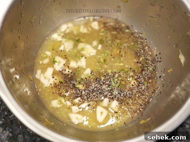 Grilled Lemon Chicken Breasts - The Grateful Girl Cooks! Honey, Lemon juice and zest, garlic, and spices are mixed for the marinade.