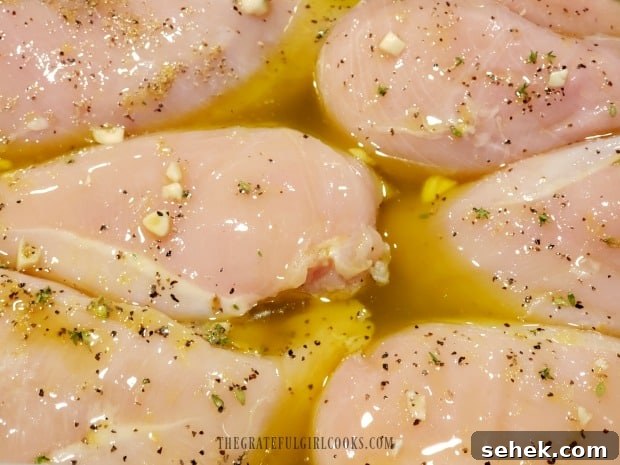 Grilled Lemon Chicken Breasts - The Grateful Girl Cooks! Marinated chicken breasts are refrigerated for 3-4 hours before grilling.