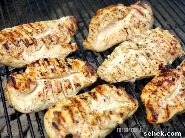 Grilled Lemon Chicken Breasts - The Grateful Girl Cooks! The chicken is turned half way through grilling to brown both sides.