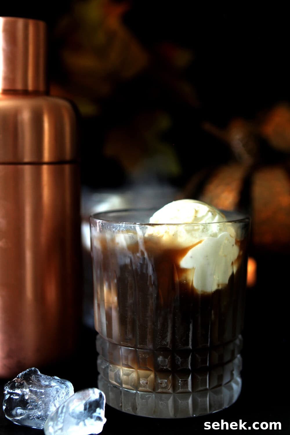 Kahlua Vodka Ice Cream Cocktail Recipe for Dessert Drinks 3 Vanilla ice cream is used in place of half and half in this vodka and Kahlua cocktail; shown in a lowball glass.