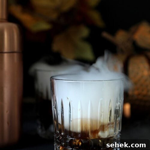 Kahlua Vodka Ice Cream Cocktail Recipe for Dessert Drinks 7 Black Vodka & Kahlua Cocktail with Vanilla Ice Cream in a crystal low ball glass.