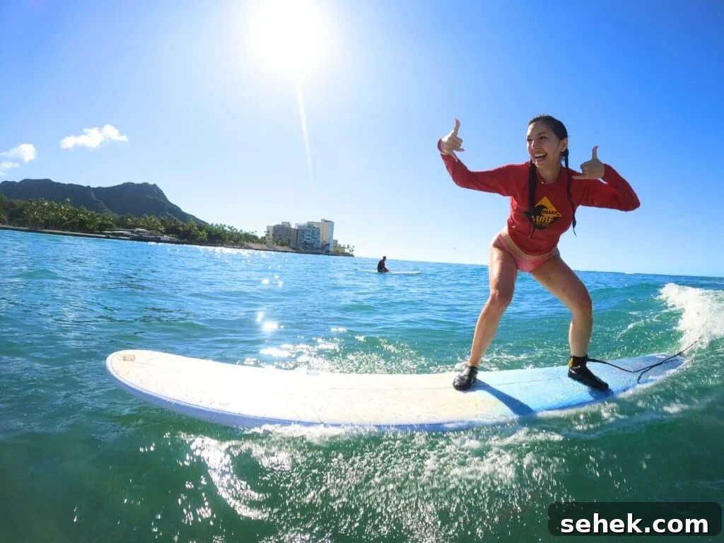Girl surfing in Waikīkī with the Diamond Head in the background.