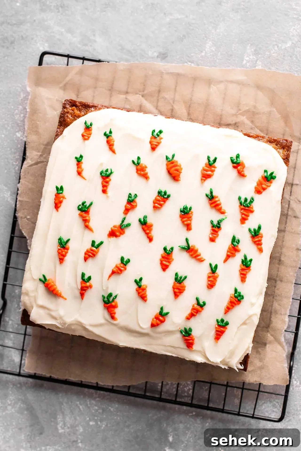 Mini Carrot Cake Recipe for Moist Mini Layer Cakes 5 decorated mini carrot cake on parchment lined wire