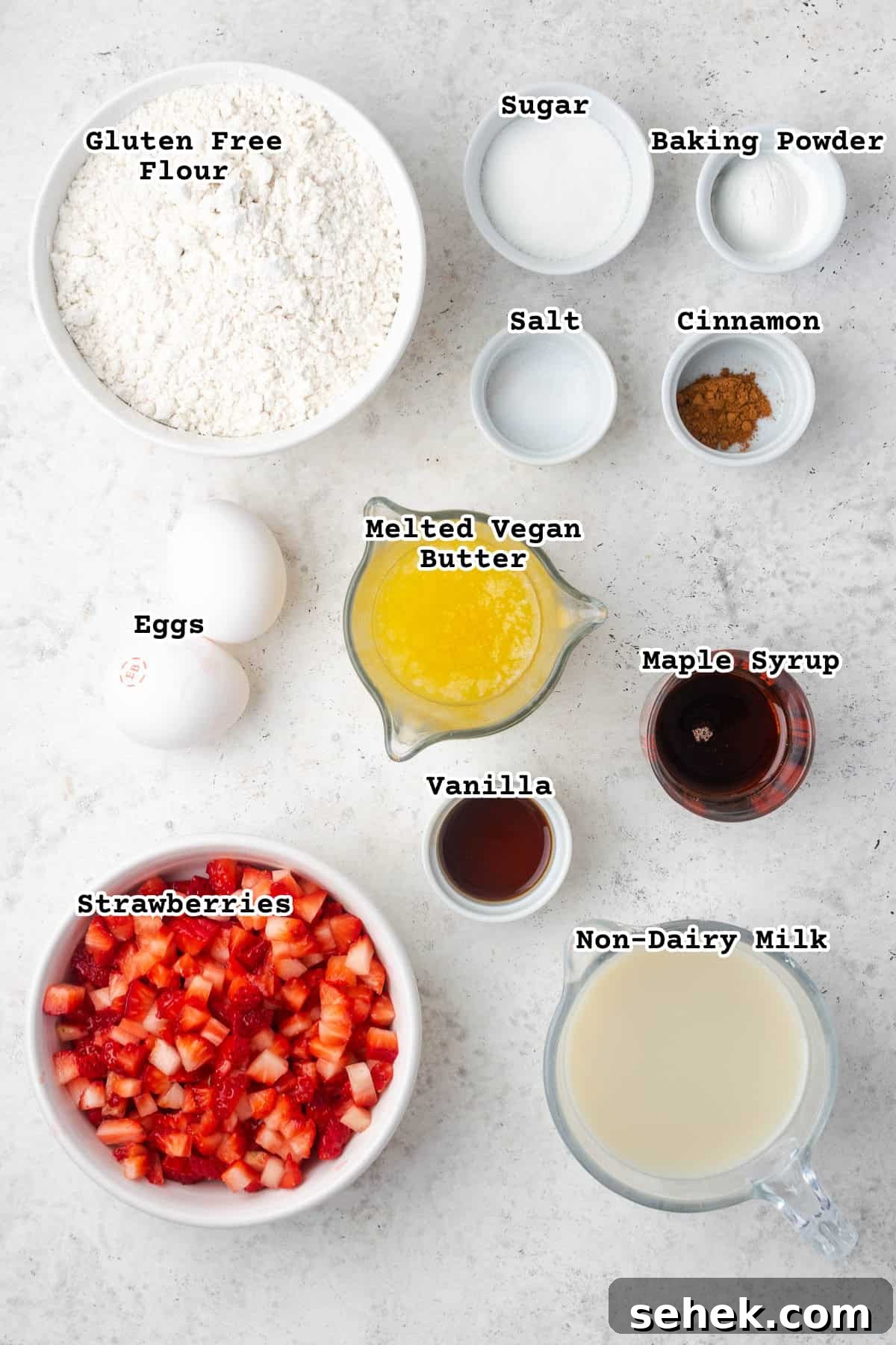 Gluten-Free Strawberry Waffle Recipe for Fluffy Breakfast 2 Ingredients for gluten free strawberry waffles on a white counter.
