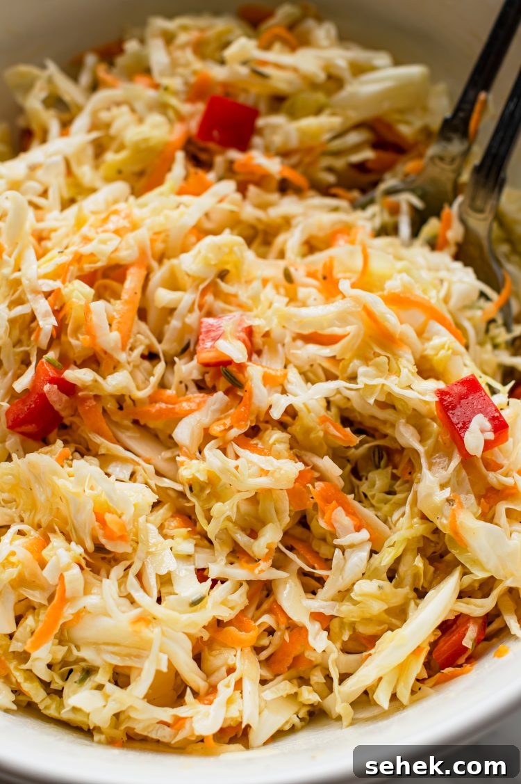 Tangy Sweet Coleslaw Recipe for Crisp, Creamy Side Dish 2 This sweet and tangy coleslaw pairs well with burgers, barbecue, or any other cookout recipes!