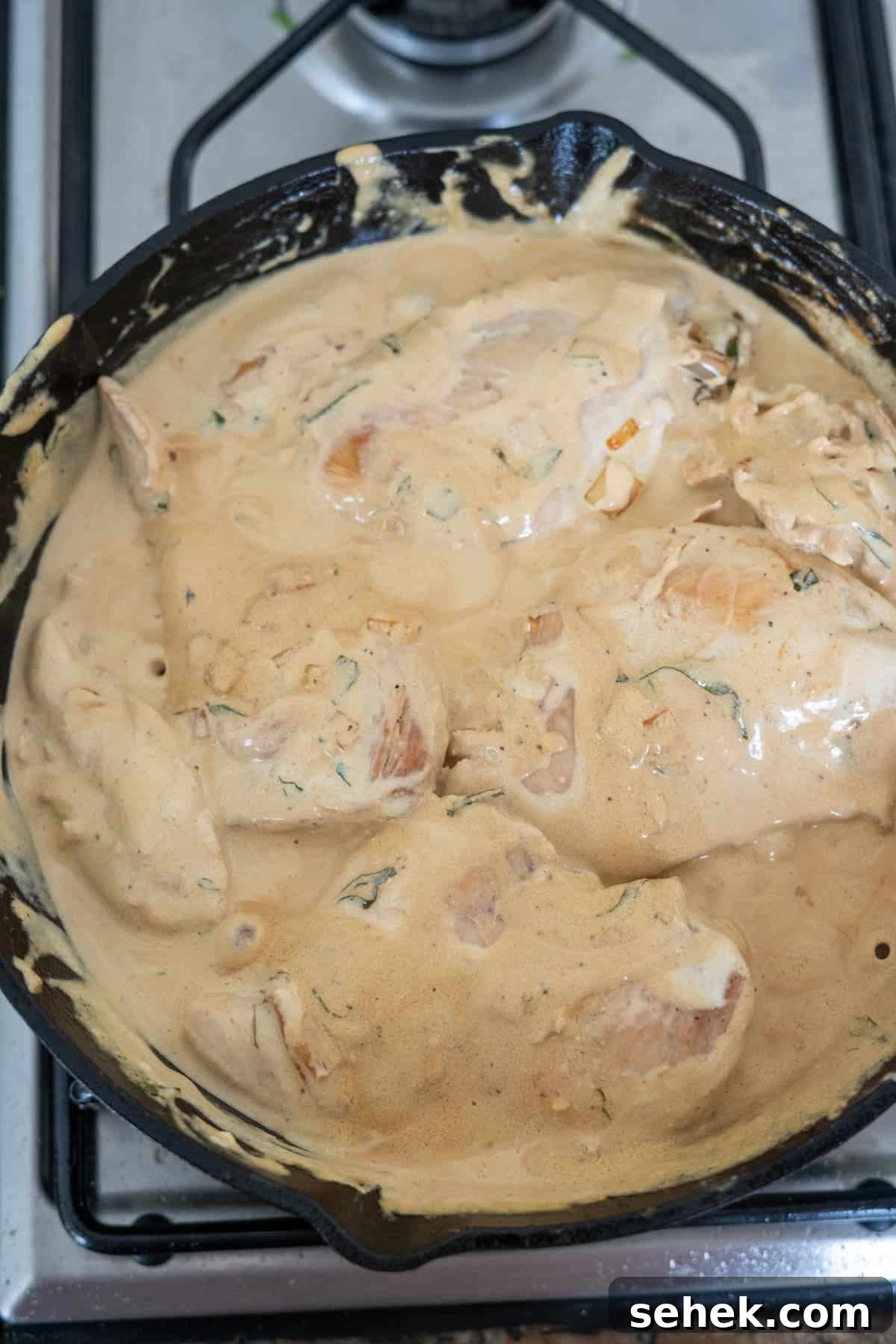 Creamy Tarragon Chicken Skillet with Lemon and Garlic 7 Tarragon chicken cooked in a skillet with a creamy sauce.