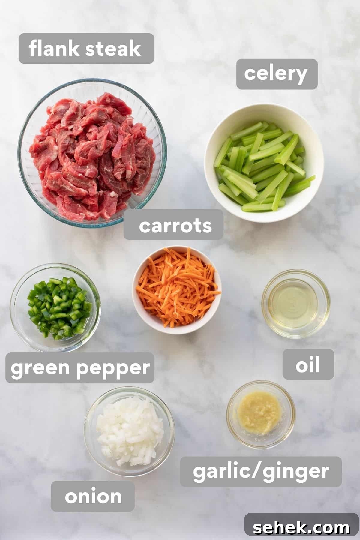 Sizzling Beef Stir-Fry with Shredded Vegetables and Ginger 2 Ingredients for beef stir-fry on a countertop