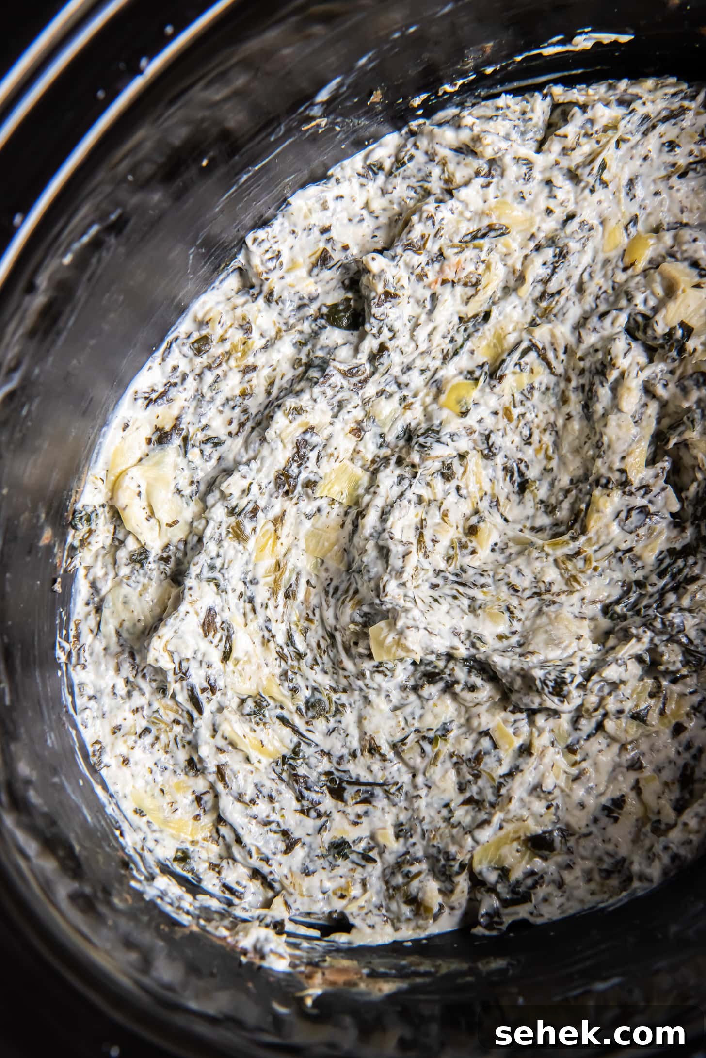 Creamy Slow Cooker Spinach Artichoke Dip Recipe 5 spinach artichoke dip in crockpot after cooking