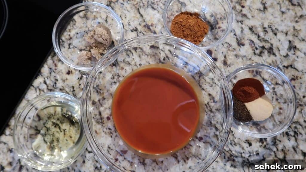 Instant Pot Nashville Hot Chicken with Spiced Rice 14 Combining hot sauce, vegetable oil, brown sugar, cayenne pepper, paprika, granulated garlic, and chili powder to make Nashville Hot Sauce