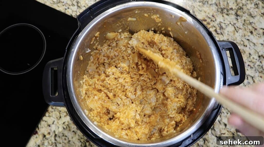 Instant Pot Nashville Hot Chicken with Spiced Rice 19 Fully incorporated rice to form Nashville Chicken & Hot Rice