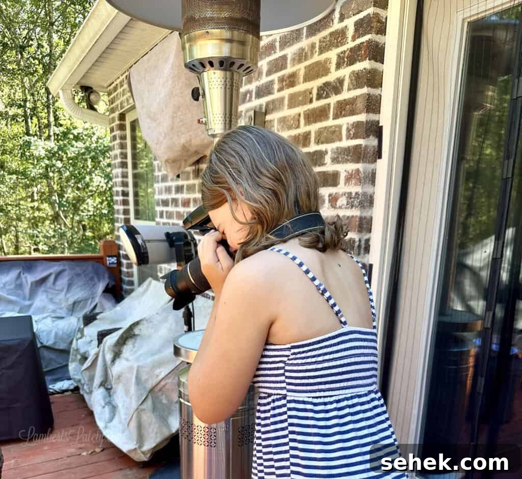 Printable Halloween Gift Tags PDF — Free Downloadable Labels 2 girl taking a picture with a dslr camera.