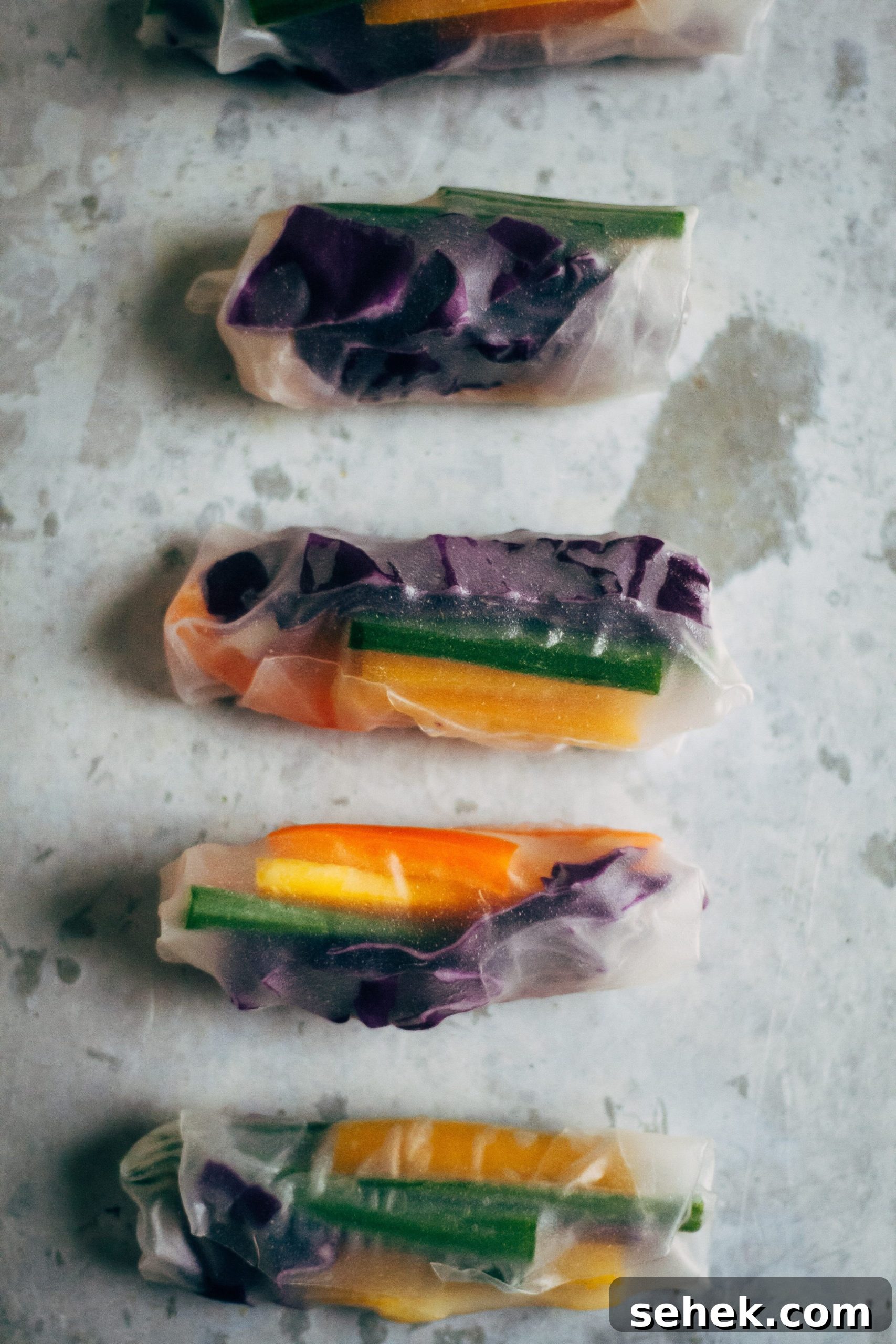 Rainbow Spring Rolls with Spicy Sesame Dipping Sauce 3 Rainbow Spring Rolls w/ Spicy Sesame Sauce | Well and Full | #vegan #recipe
