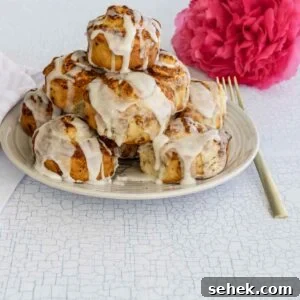 Air Fryer Pillsbury Cinnamon Rolls: Quick & Fluffy Recipe 9 Cinnamon Rolls on a plate.