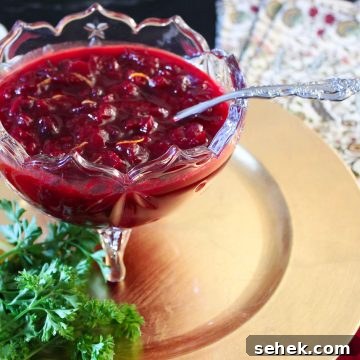 Homemade Spiced Cranberry Sauce with Warm Holiday Spices 8 Cranberry sauce in footed crystal bowl