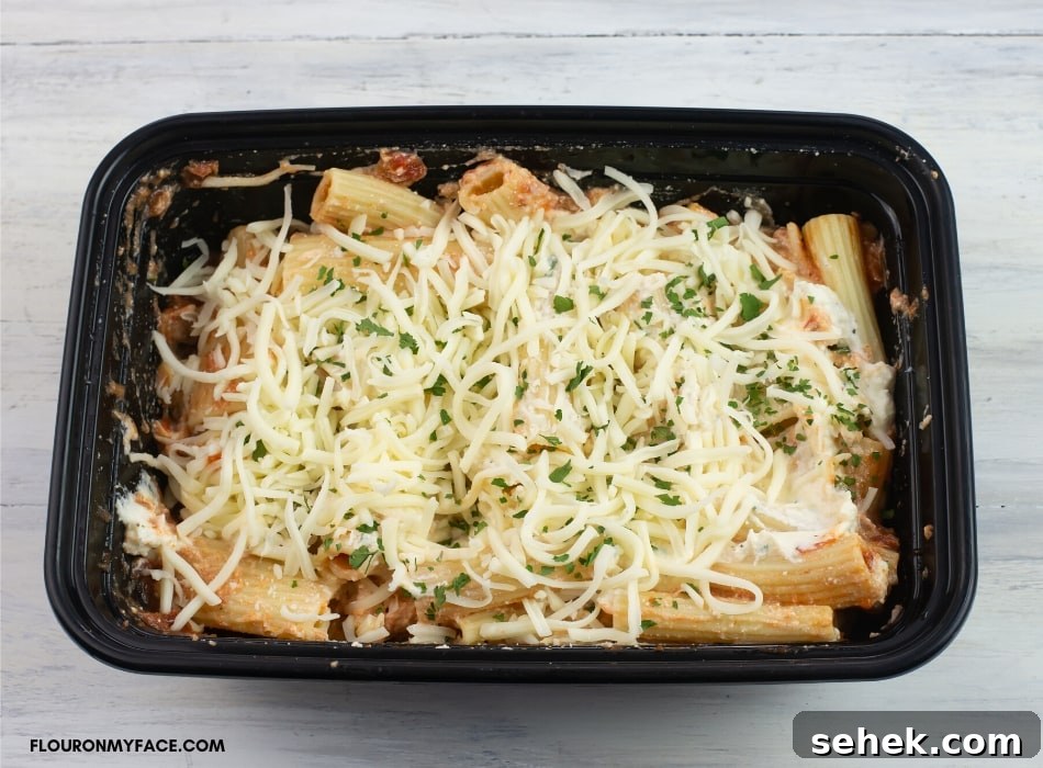 a single serve baked ziti freezer meal in a plastic food container