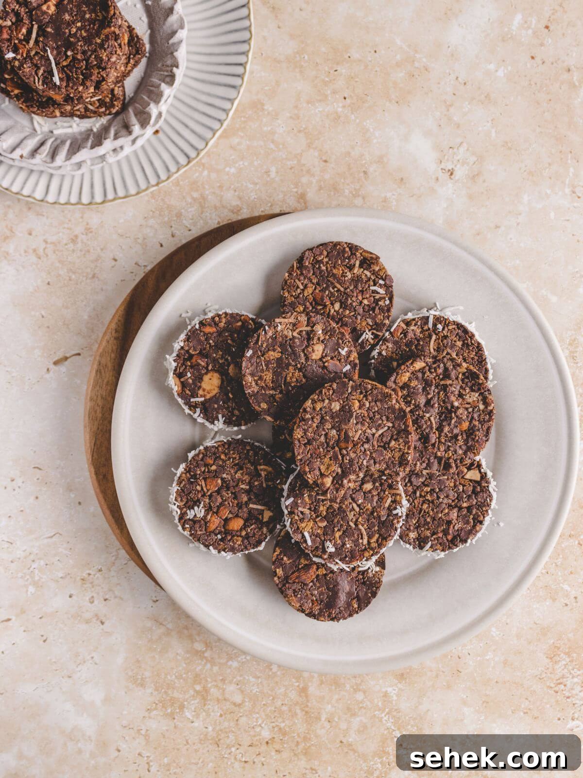 Chocolate Cornflake Cakes with Rice Krispies: No-Bake Treats 11 Cornflake rounds served on a white plate.