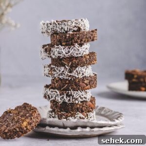 Chocolate Cornflake Cakes with Rice Krispies: No-Bake Treats 12 a photo of stacked cornflake cakes garnished with coconut shreds