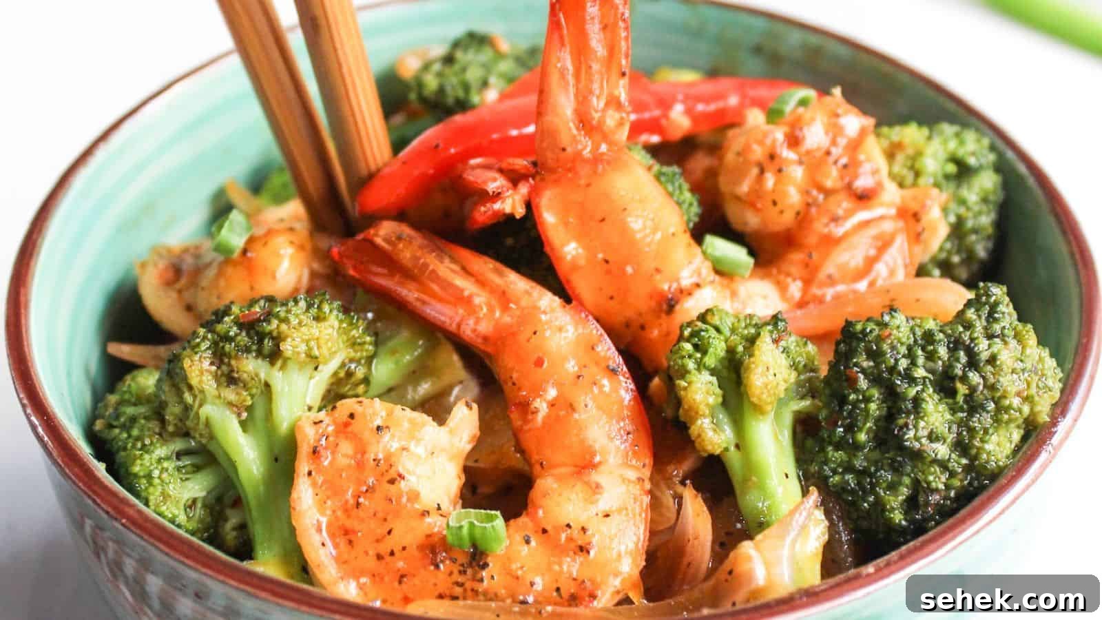 Shrimp and broccoli stir-fry in a bowl.