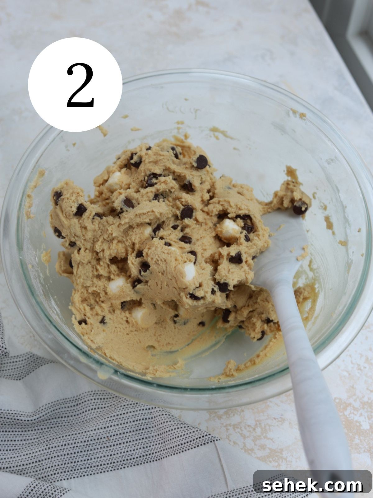 Peanut Butter Marshmallow Cookies Recipe for Soft, Chewy Treats 5 Cookie dough with chocolate chips and marshmallows in a bowl