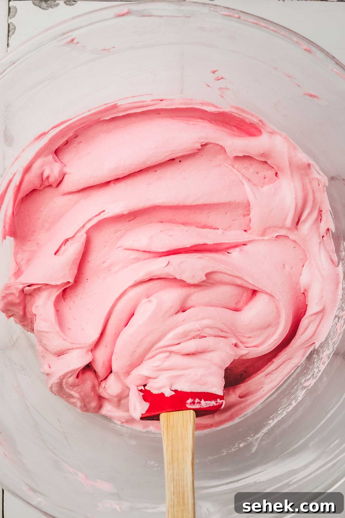 Silky Raspberry Frosting Recipe for Cakes and Cupcakes 6 large bowl with raspberry whipped cream frosting