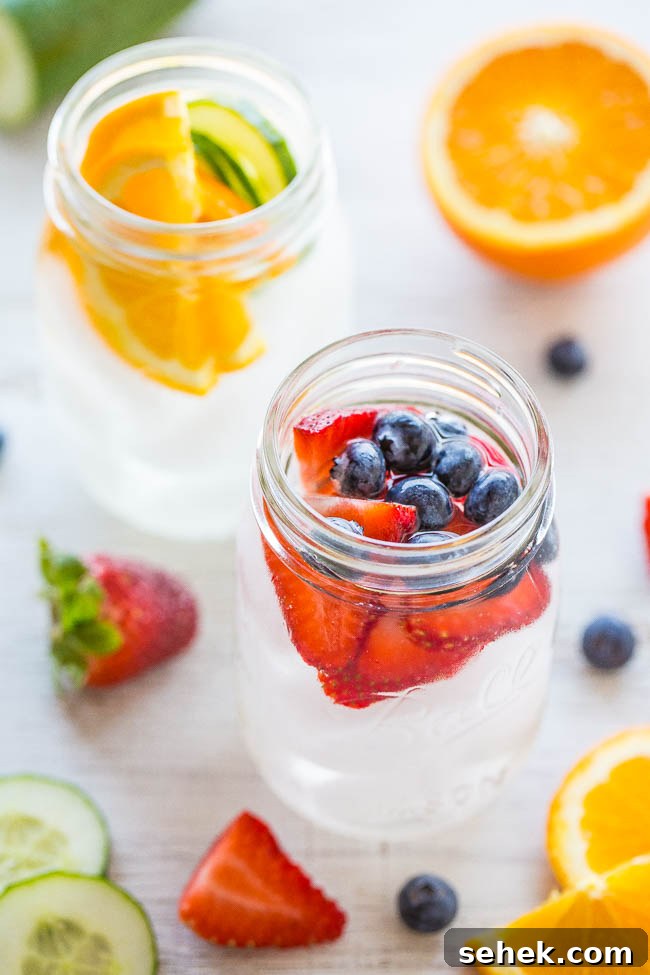 Refreshing Flavored Water Recipes for Every Taste 2 two glass jars filled with flavored water